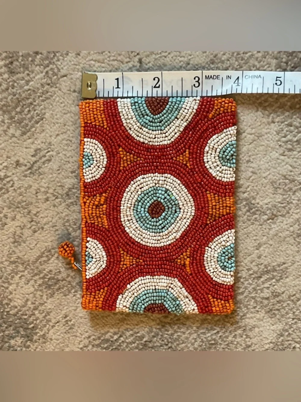 Small hand beaded clutch